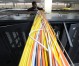 A telecommunications specialist mounts e