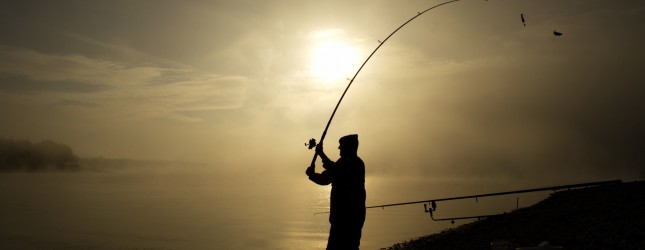A sports fisherman tries his luck early